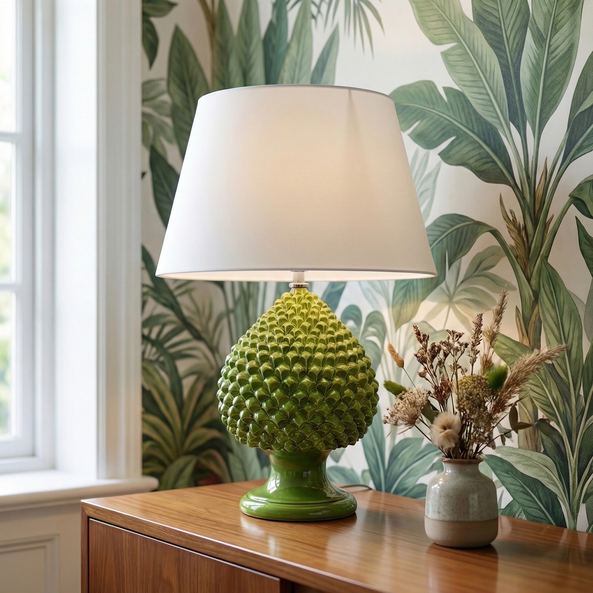 Handcrafted pine cone lamp in green leaf