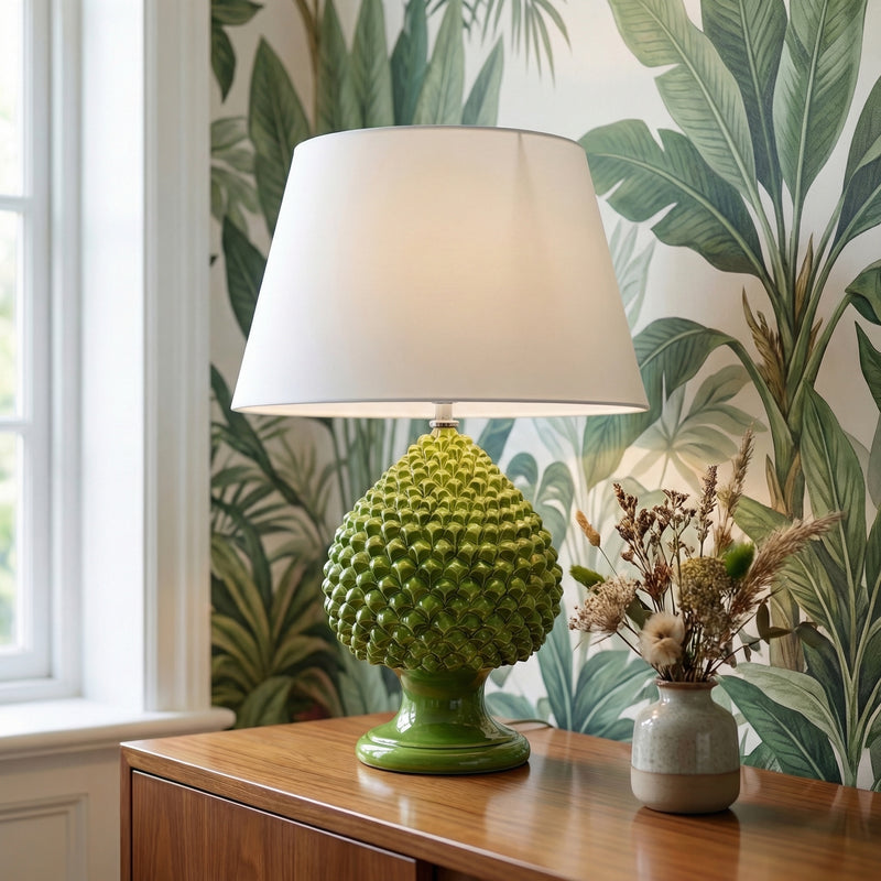 Handcrafted pine cone lamp in green leaf