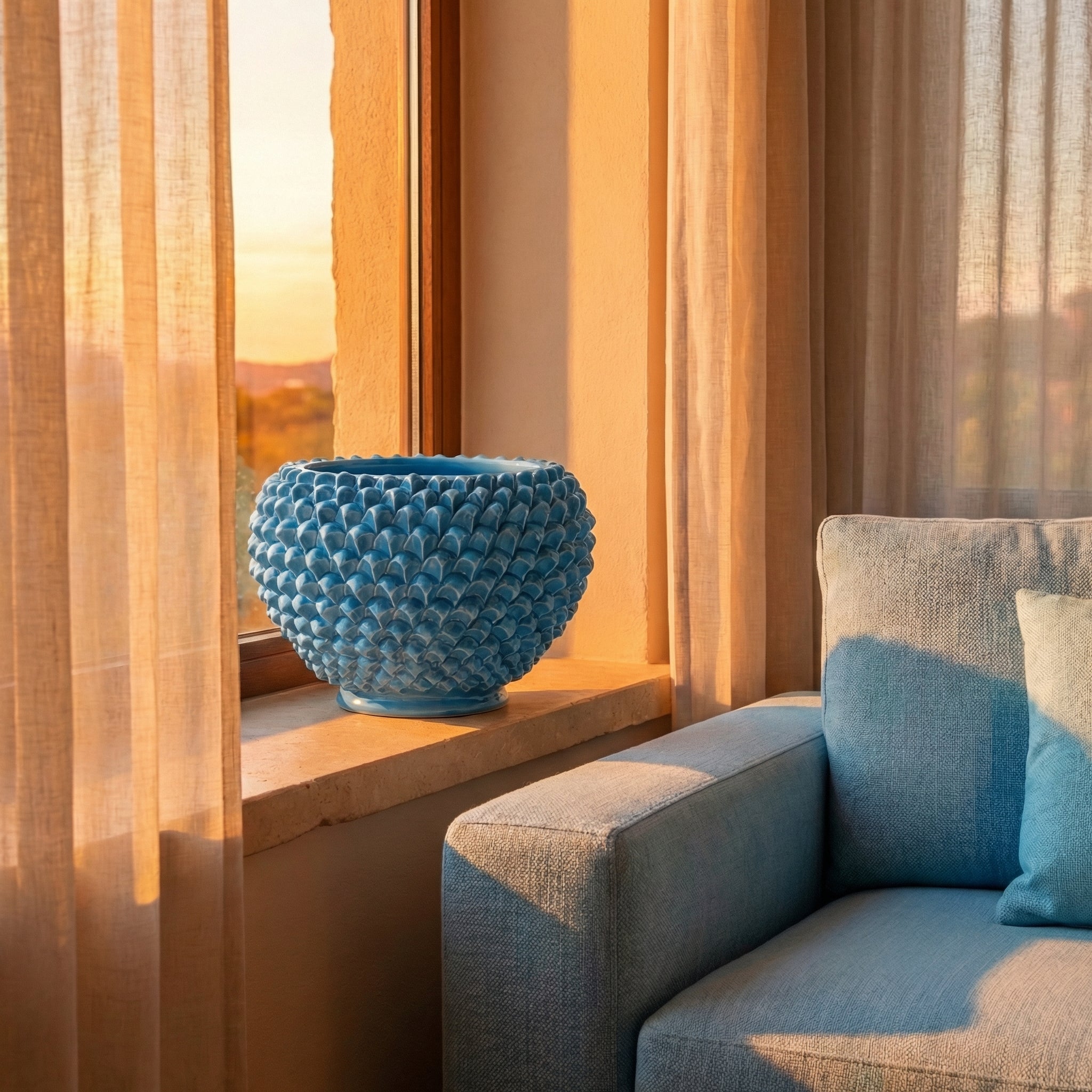 Handmade turquoise pine cone cachepot from Caltagirone