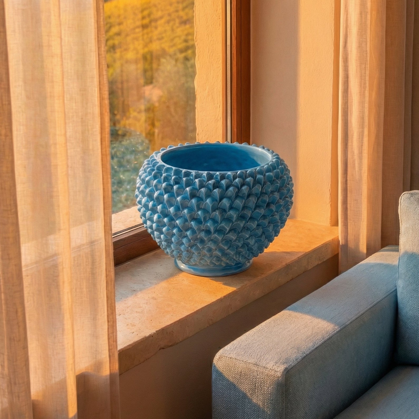 Handmade turquoise pine cone cachepot from Caltagirone