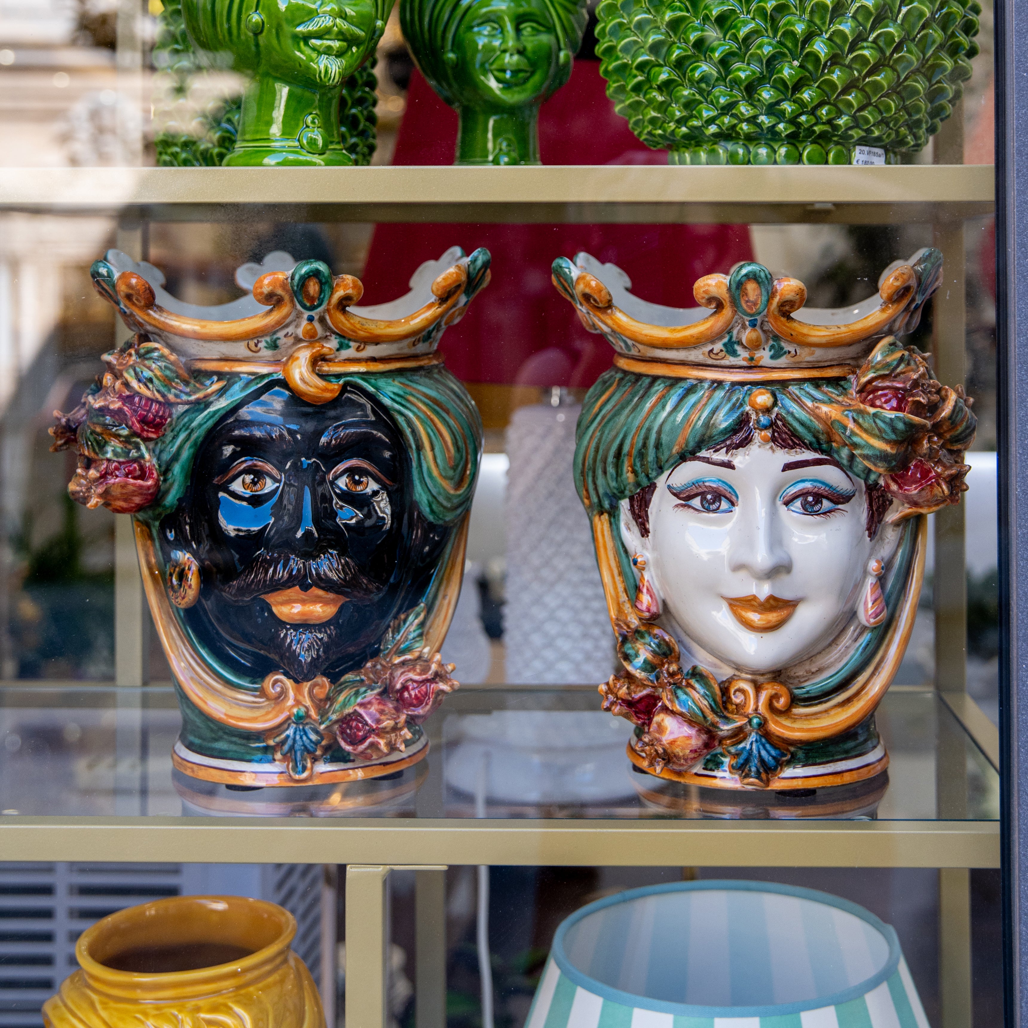 Ceramic Head with pomegranate h 25 green/orange female