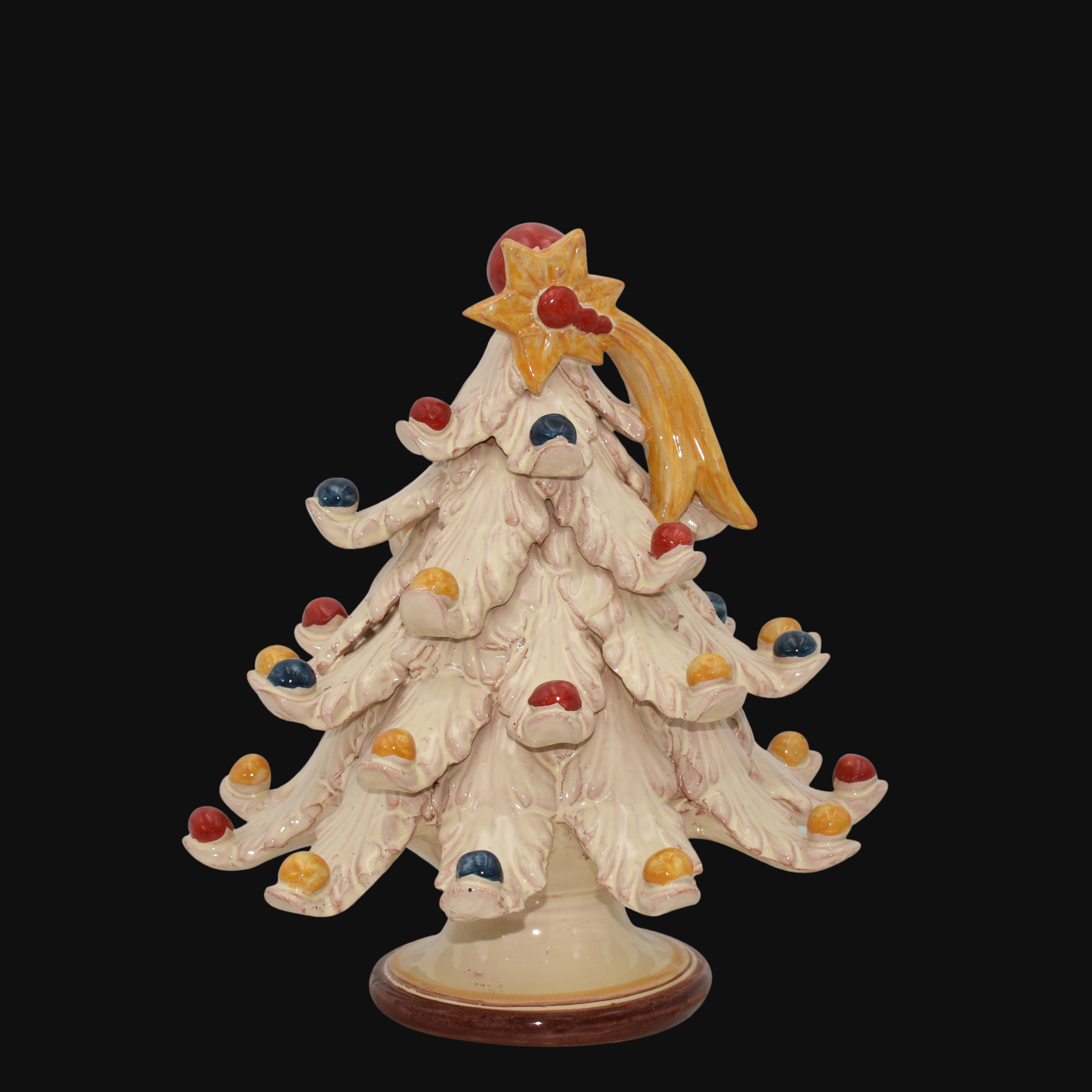 Albero di Natale in ceramica Caltagirone fatto a mano con decorazioni colorate artigianali.