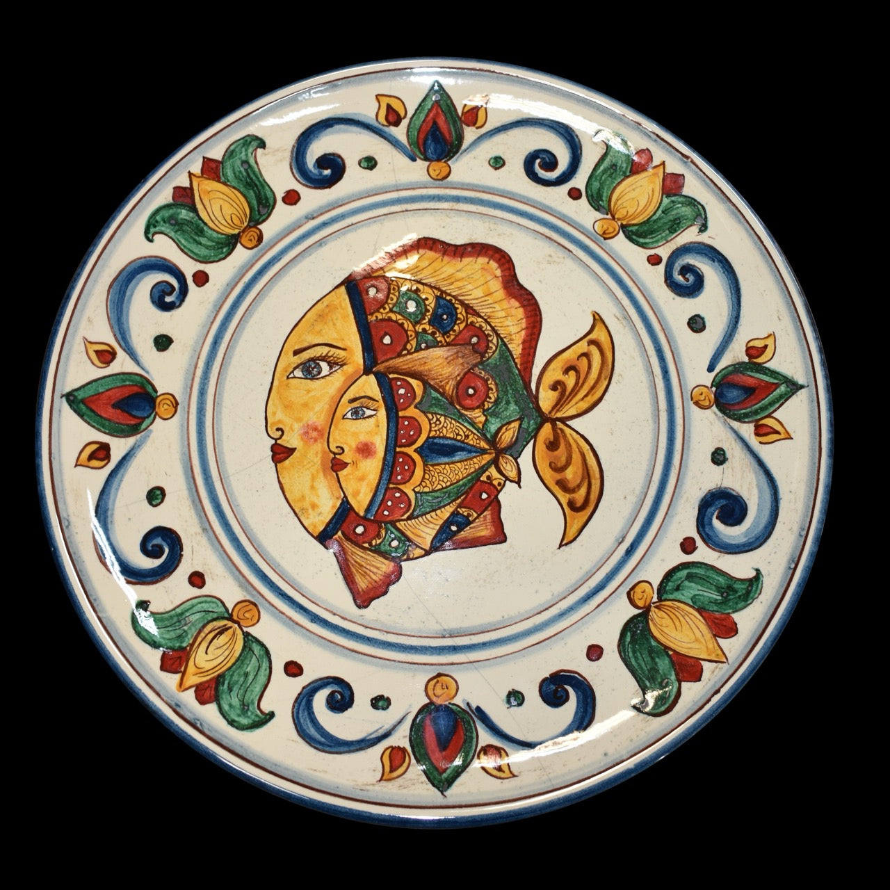 Ornamental plate in Caltagirone ceramic with fish decoration