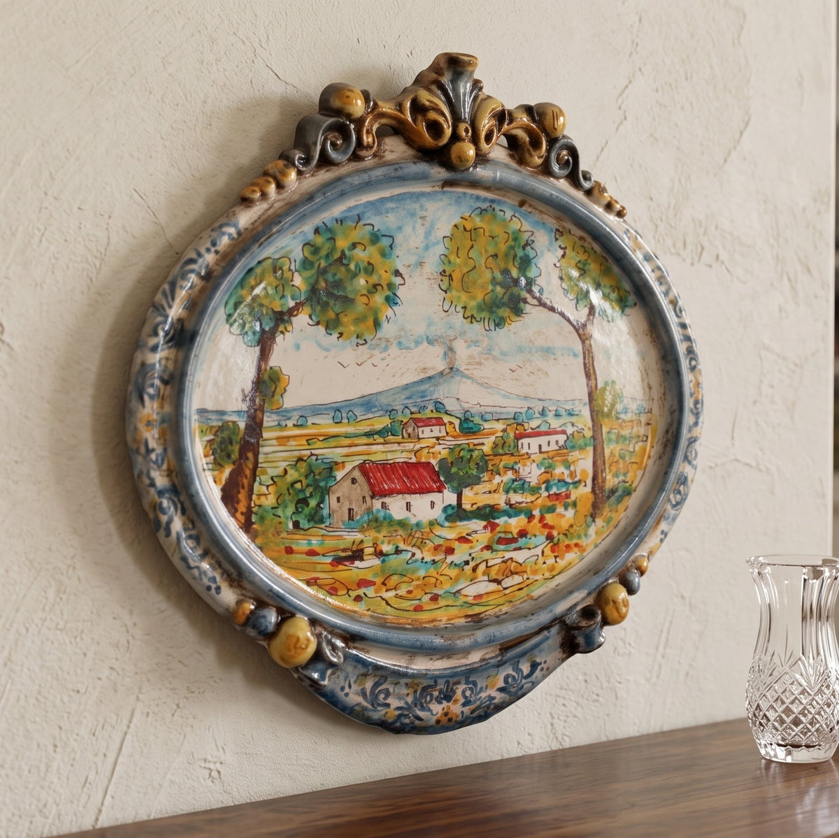Tableau Ovale en Céramique 23×25 cm, Paysage Sicilien, Bleu et Orange – Céramique Caltagirone – artisanat sicilien