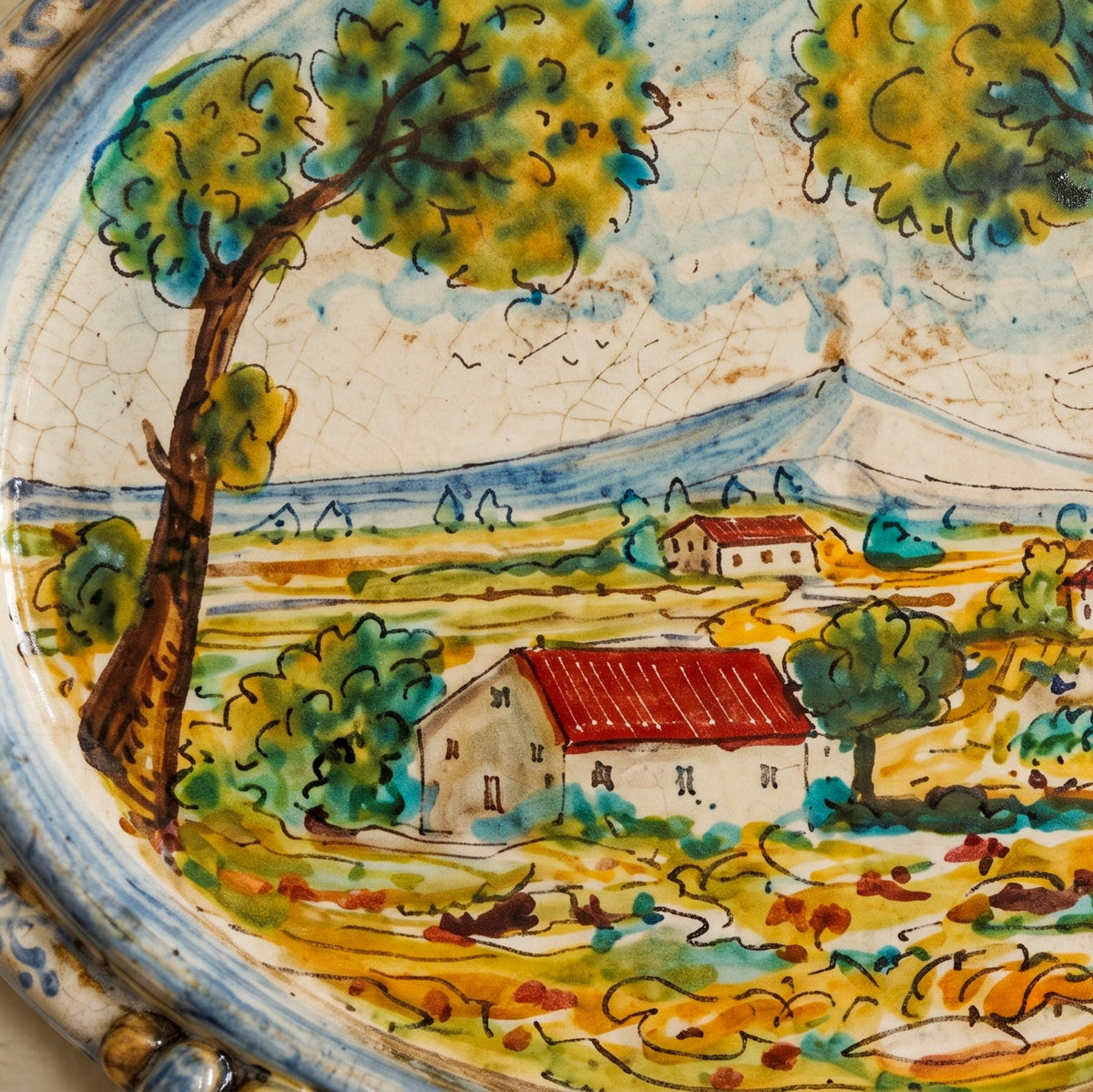 Tableau Ovale en Céramique 23×25 cm, Paysage Sicilien, Bleu et Orange – Céramique Caltagirone – artisanat sicilien