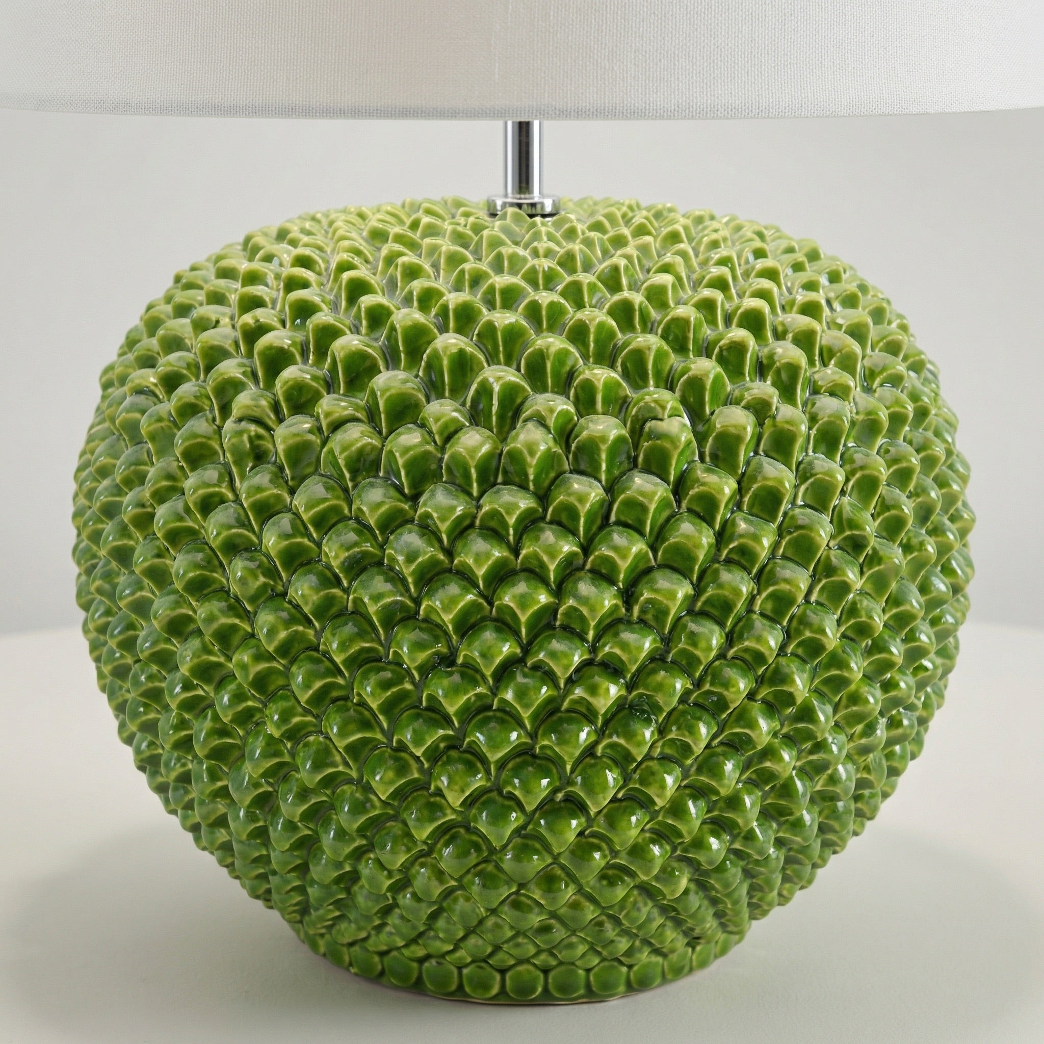 Pine cone ball lamp in various sizes, decorated in green leaf in Caltagirone ceramic.