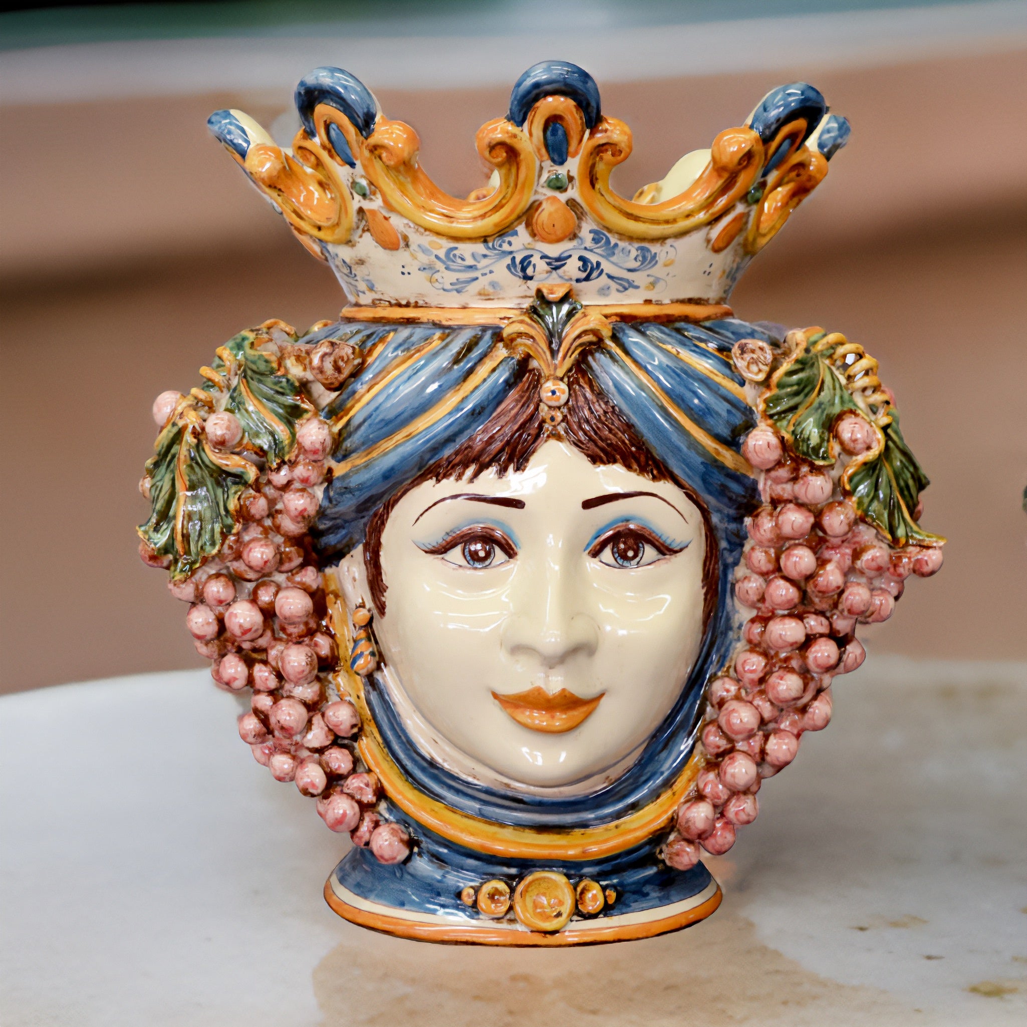 Ceramic Head with grapes h 40 blue/orange female