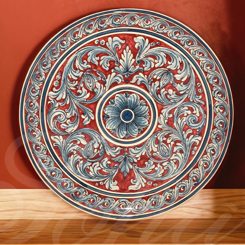 Piatto ornamentale Ø 35/40/45 ornato blu/bordeaux in ceramica artigianale di Caltagirone. - Ceramiche di Caltagirone Sofia