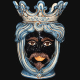 Ceramiche di Caltagirone fatti a mano con volto regale blu e corona, arte tradizionale siciliana